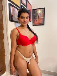 resmi nair poses bikini 
